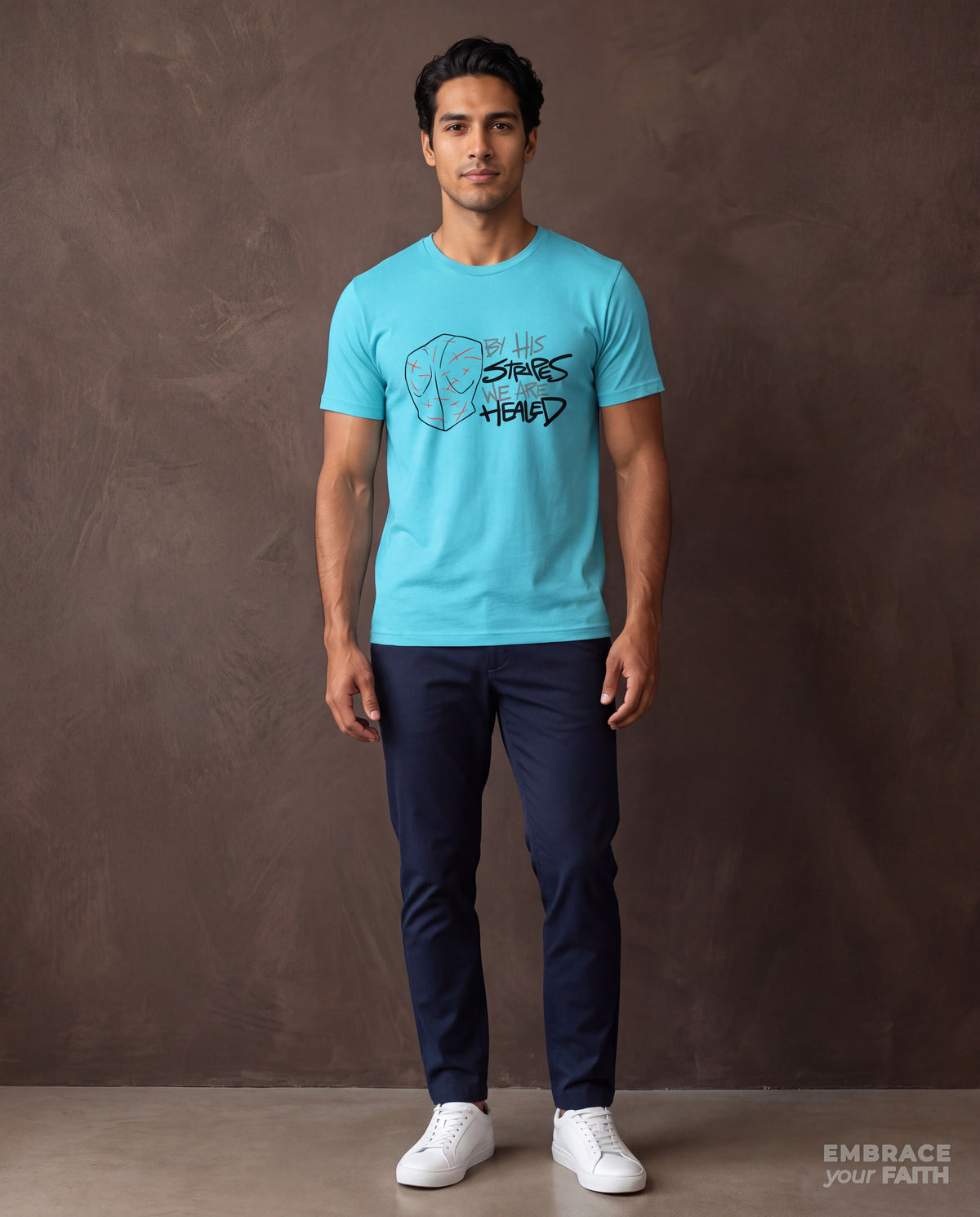 By His Stripes We Are Healed T-Shirt with black print in Turquoise, worn by a model