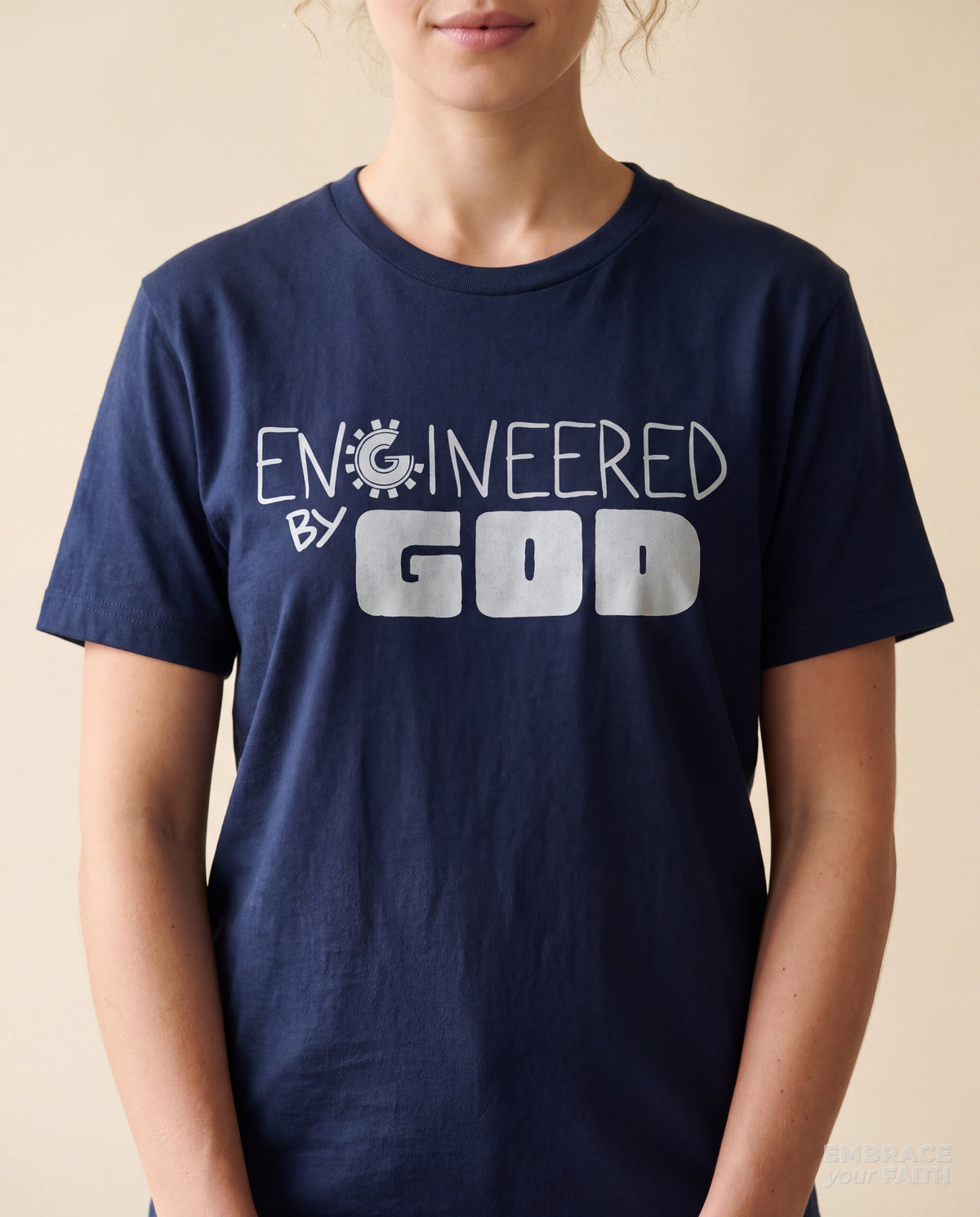 Close-up of the print on the Engineered By God Classic Unisex T-Shirt (Blue) in Navy