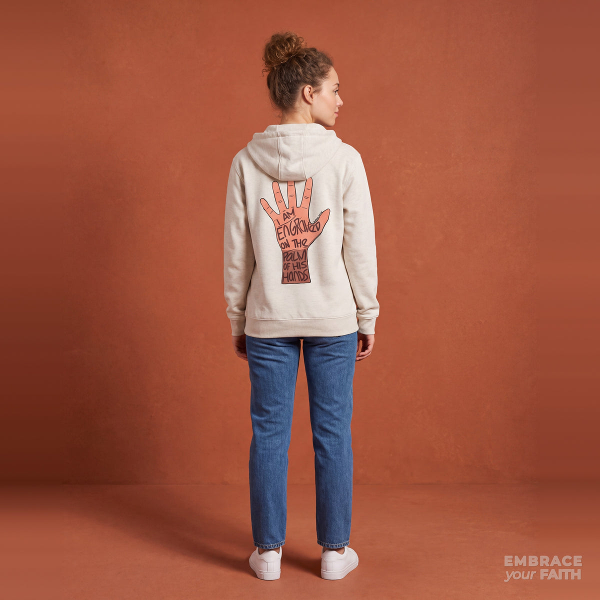 Engraved on His Palms Full-Zip Hoodie in Oatmeal Heather, model back view – Isaiah 49:16