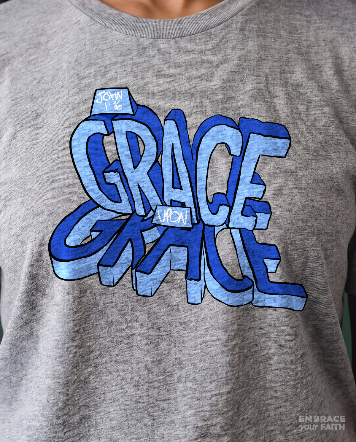 Close-up of the print on the Grace Upon Grace Graphic Unisex T-Shirt – Blue Hologram in Athletic Heather