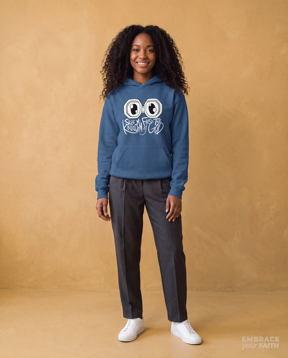 EYF model wearing the Seek Ye First the Kingdom Unisex Hoodie in Indigo Blue